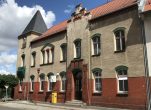 Teilvermietetes Wohn- und Geschäftshaus - Straßenansicht