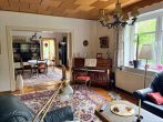 Villenartiges Einfamilienhaus mit Flair und viel Nebengelaß - Teilansicht Wohnzimmer Erdgesc